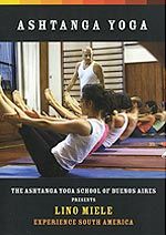 Cover of the Experience South America DVD: a led class in Buenos Aires, a row of students with their legs raised over their heads.