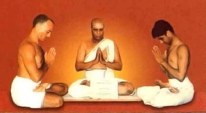 A painted scene of three figures seated in prayer before an open manuscript.