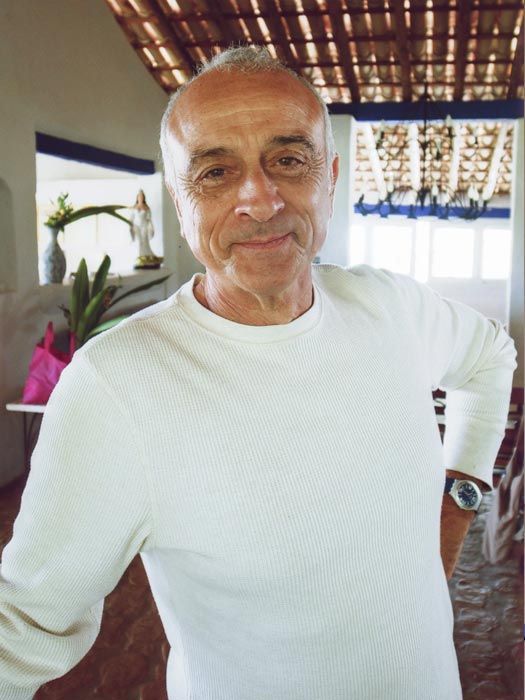 Lino Miele in the shala at Kovalam, the light coming through the window behind him.